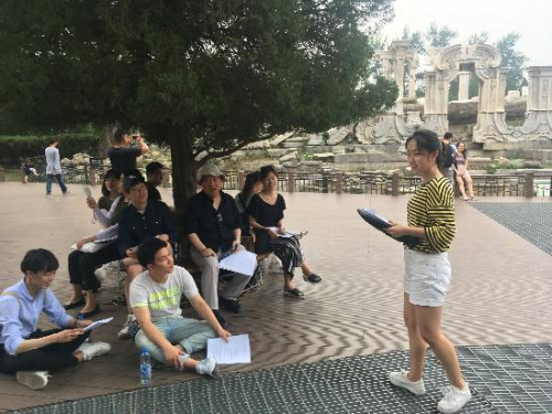 Presenting in front of Yuanmingyuan