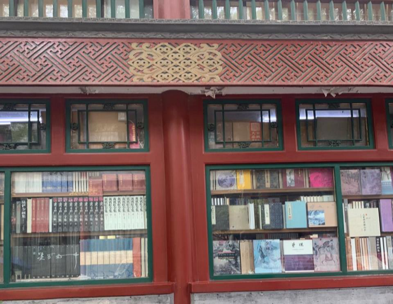 A 21st-century window full of books, reminiscent of an 18th-century window
