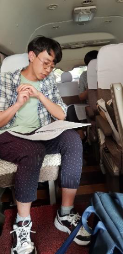Presentation during the bus ride to the National Museum of China (left)