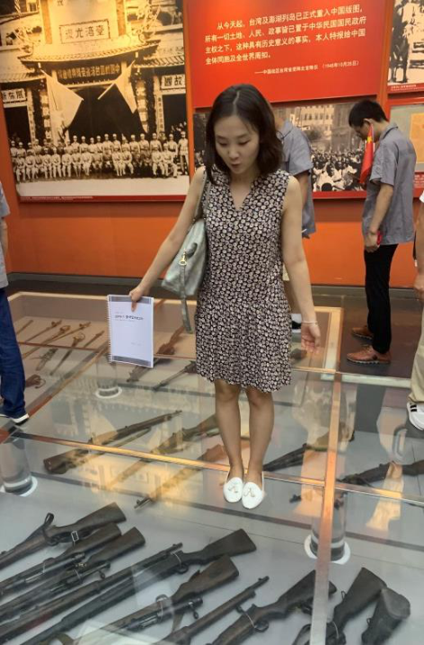 Weapons used at the time are displayed on the floor.